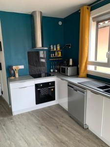 Appartements T2 Cosy - 70m2 au Coeur de ville : photos des chambres
