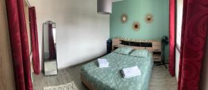 Appartements T2 Cosy - 70m2 au Coeur de ville : photos des chambres