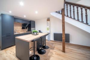 Appartements MyAppart71 - La prefecture - Appartement en Coeur de Ville : photos des chambres