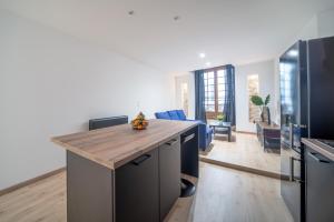 Appartements MyAppart71 - La prefecture - Appartement en Coeur de Ville : photos des chambres