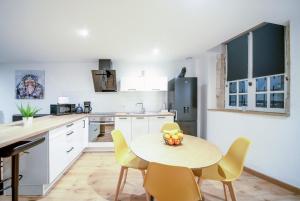 Appartements MyAppart71 - La prefecture - Appartement en Coeur de Ville : photos des chambres