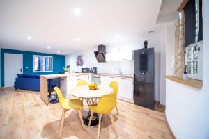 Appartements MyAppart71 - La prefecture - Appartement en Coeur de Ville : photos des chambres