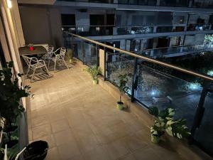 green apartment 214 with private PARKING