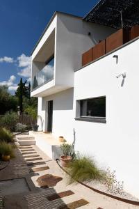 Villas Magnifique contemporaine avec couloir de nage 15X3,5 : photos des chambres