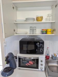 Appartements Grands Studios Maillochon acces Gare de Poitiers et Centre ville a Pieds : photos des chambres