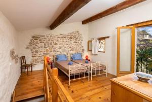 Maisons de vacances Villa en campagne avec cour interieure : photos des chambres