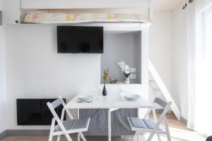 Appartements Le Partage des eaux - 4 couchages - Hypercentre - Clim - Wifi : photos des chambres