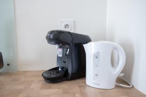Appartements Le Partage des eaux - 4 couchages - Hypercentre - Clim - Wifi : photos des chambres