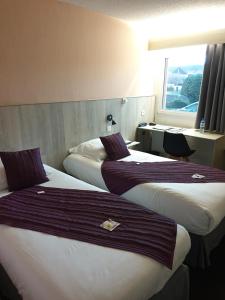 Hotels Brit Hotel Dak Hotel : photos des chambres