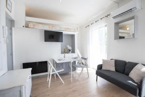 Appartements Le Partage des eaux - 4 couchages - Hypercentre - Clim - Wifi : photos des chambres