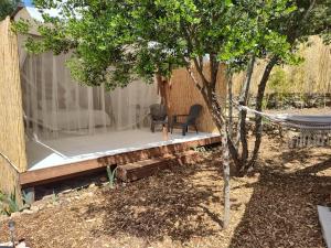 Tentes de luxe Glamping at Seraphin's : photos des chambres