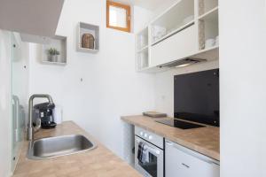 Appartements Le Partage des eaux - 4 couchages - Hypercentre - Clim - Wifi : Appartement - Vue sur Ville