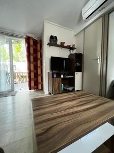 Campings Superbe Mobilehome 3 ch, climatise tout confort : photos des chambres