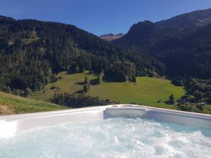 Maisons d'hotes Aux fermes de la Croix, Maison d'hotes, Spa : photos des chambres