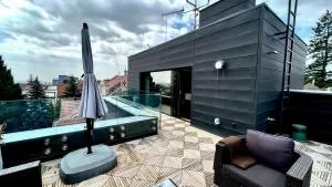 Apartmán se saunou a terasou s výhledem na Brno - Jundrov