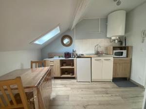 Appartements Chez Clovis - proche gare centre et arena : photos des chambres