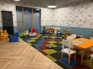 TOTU TODAY-SIENNA GROBLA APARTAMENTY, Faktura VAT, self check-in