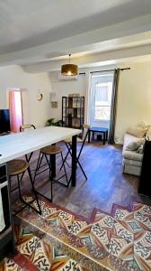 Appartements Le Rustique : photos des chambres