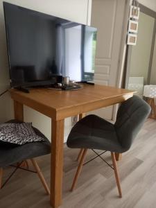 Appartements Le Doubs Cosy : photos des chambres