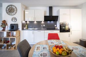 Appartements La Capucine, centre historique d-Obernai : photos des chambres