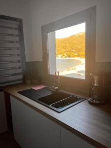 Appartements T2 Les pieds dans l-eau : photos des chambres