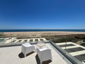New penthouse with sunny beach view