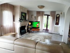 Maisons de vacances Maison avec jardin 6 min du RER : photos des chambres