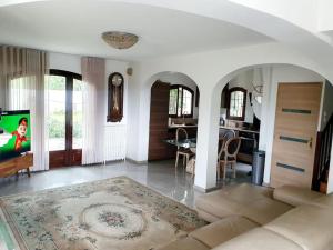 Maisons de vacances Maison avec jardin 6 min du RER : photos des chambres