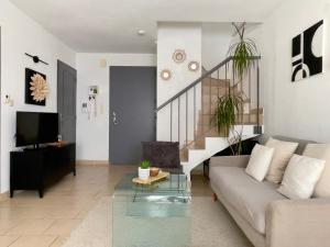 Appartements Charmante Maison avec Jacuzzi et Parking : photos des chambres