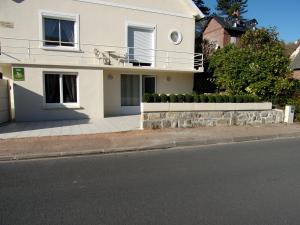 Appartements Le Petit Clos Des Camelias : photos des chambres