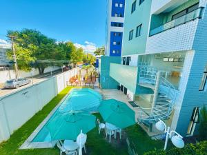"Apartamento EXCLUSIVO - Novo com 2 Quartos Climatizados, Suíte, Varanda, Piscina e Academia - Vaga na garagem, TV de 70 Localização Premium ao Lado do Shopping Rio Mar - Inclui Enxoval Completo e Mimos!"