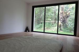 Maisons de vacances Carnac au calme, en pleine foret a 400 m d-un bras de mer : photos des chambres