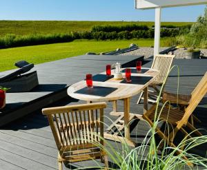 Sealect-Hus-5-direkt-an-der-Nordsee-nahe-St-Peter-Ording-mit-Sauna-Whirlpool-und-Kamin