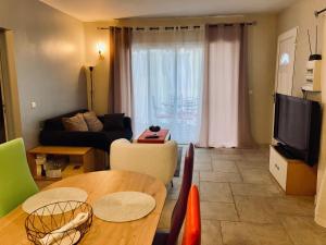 Appartements Appartement avec grande terrasse : photos des chambres