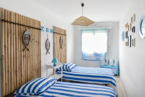 Appartements Pegase Bleu - A 500m de la plage : photos des chambres