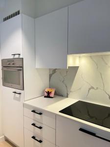 BD Appartement - Modern en gezellig - Strand en winkels vlakbij