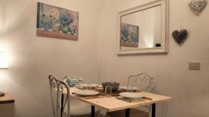 Delizioso indipendente fronte mare con giardino