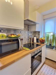 Appartements Le Tropical Maconnais de Miss K : photos des chambres