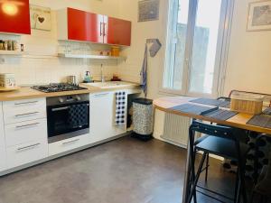 Appartements Maison de ville - cosy - centre ville - wifi -gare : photos des chambres