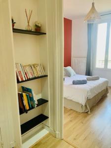 Appartements Maison de ville - cosy - centre ville - wifi -gare : photos des chambres