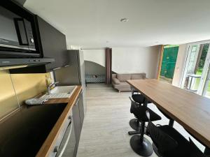 Appartements Viens dans mon beau jardin ! 012 : photos des chambres