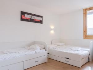 Appartements travelski home select - Residence Les Lys : photos des chambres