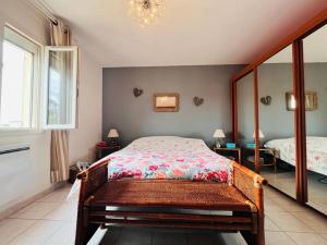 Villas Villa climatisee avec jacuzzi : photos des chambres