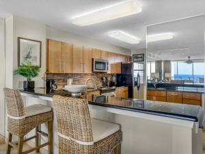 Hidden Dunes Condominium 0803 by Newman-Dailey