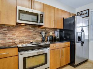 Hidden Dunes Condominium 0803 by Newman-Dailey