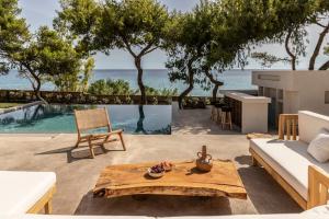 Bozonos Villa - Beachfront Simplicity with Heated Pool