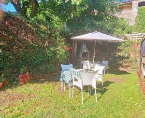 Apartamentos & Casa Rural Boada con Jardin Interior y Barbacoa