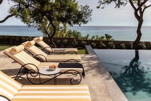 Bozonos Villa - Beachfront Simplicity with Heated Pool