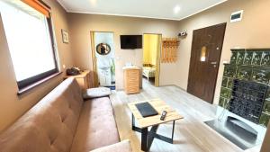 Słońce i Woda - 2 domki nad brzegiem jeziora Śniardwy z własnym pomostem, zejściem do wody i przecudnym widokiem na jezioro