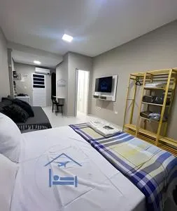 Ap Elegante e pratico com ar, ao lado do Aeroporto - Jardim Bela Vista